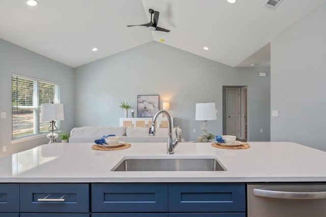 kitchen with blue cabinets, visible vents, a sink, stainless steel dishwasher, and open floor plan