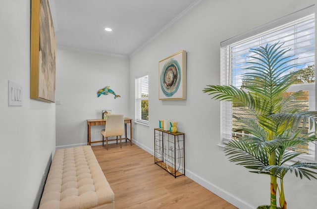 hall with recessed lighting, light wood-type flooring, baseboards, and ornamental molding