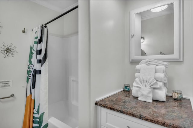 full bathroom with vanity and a shower with shower curtain