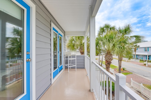 balcony featuring a sunroom