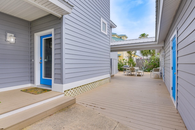 deck featuring outdoor dining area