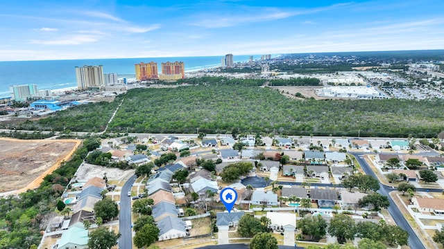 drone / aerial view featuring a water view and a city view