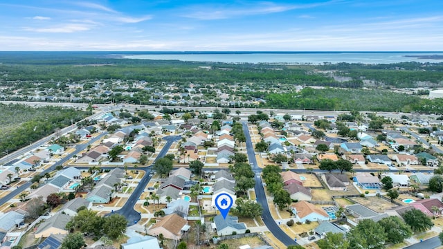 aerial view featuring a residential view and a water view