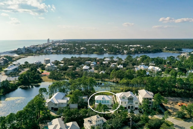 drone / aerial view with a water view