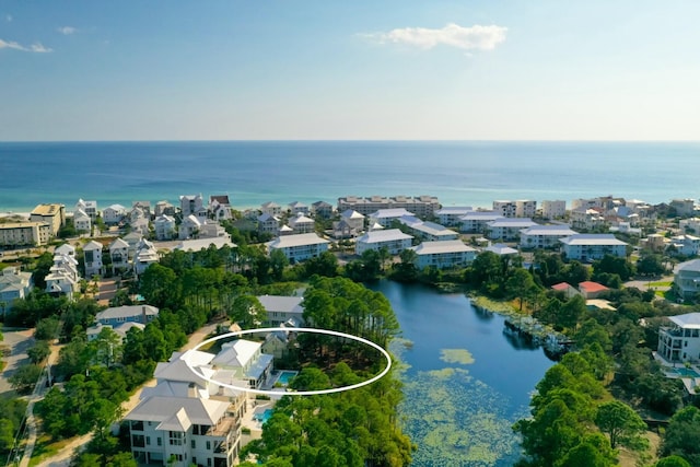 aerial view with a residential view and a water view