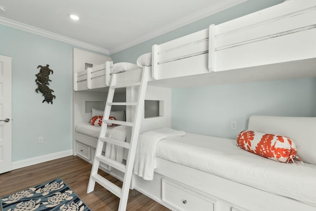 bedroom with dark wood-style floors, recessed lighting, baseboards, and ornamental molding