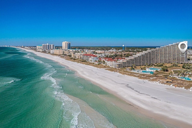 drone / aerial view with a view of city, a beach view, and a water view