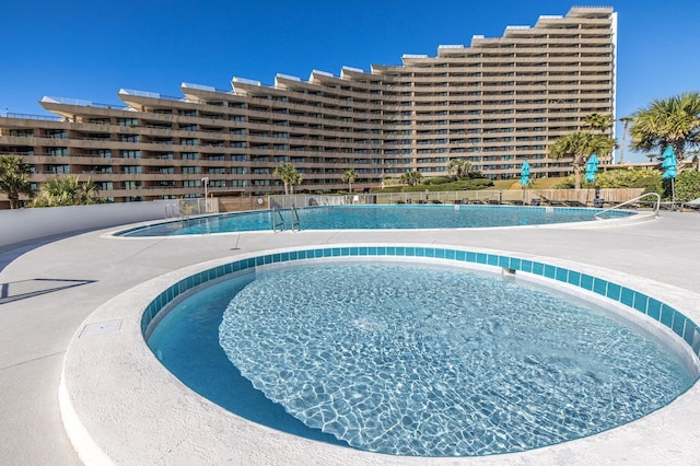 community pool with fence