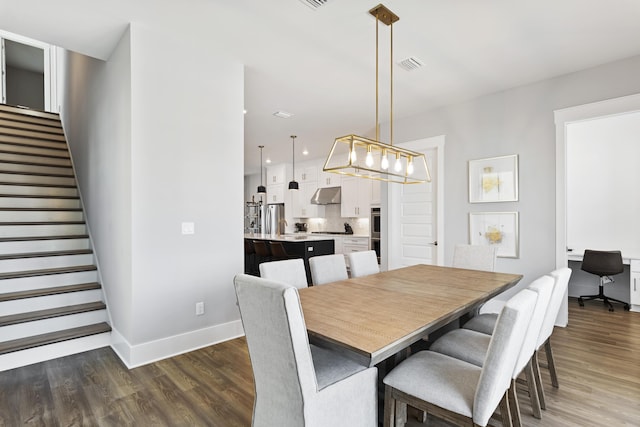 dining room featuring visible vents, wood finished floors, recessed lighting, stairway, and baseboards