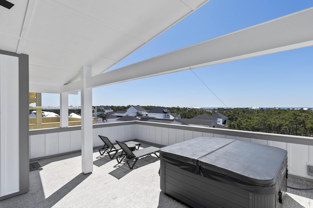 view of patio / terrace with a hot tub