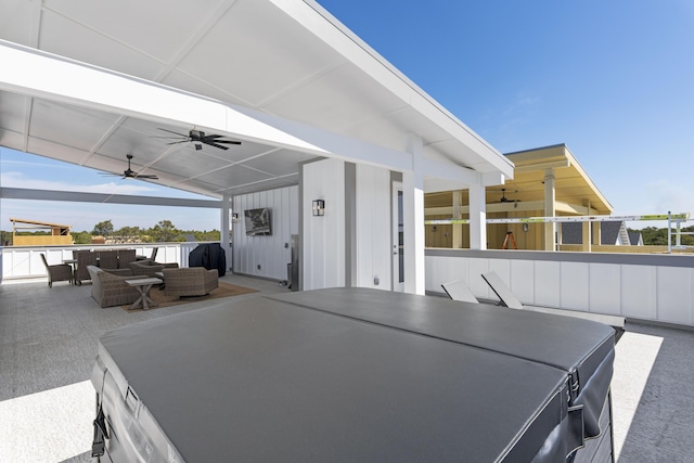 view of patio with outdoor dining area, ceiling fan, and outdoor lounge area