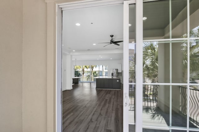 doorway to outside featuring dark wood finished floors, recessed lighting, and ceiling fan