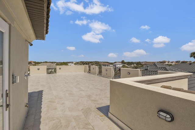 view of patio / terrace with a balcony