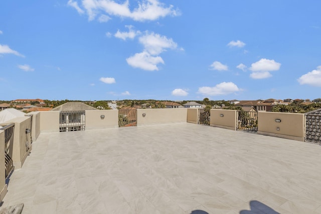 view of patio / terrace with a gate and fence