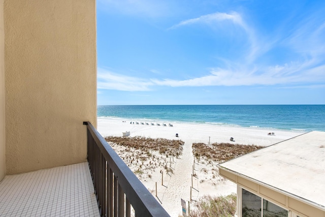 view of water feature with a beach view