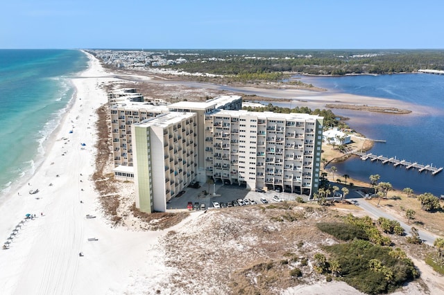 bird's eye view with a beach view and a water view