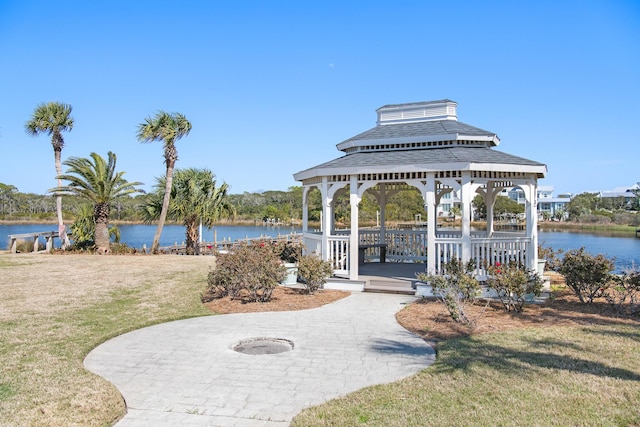 view of patio / terrace with a gazebo and a water view