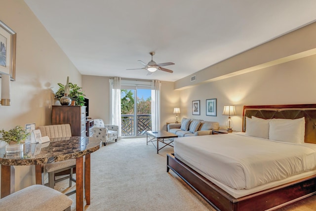 carpeted bedroom featuring visible vents, ceiling fan, and access to outside