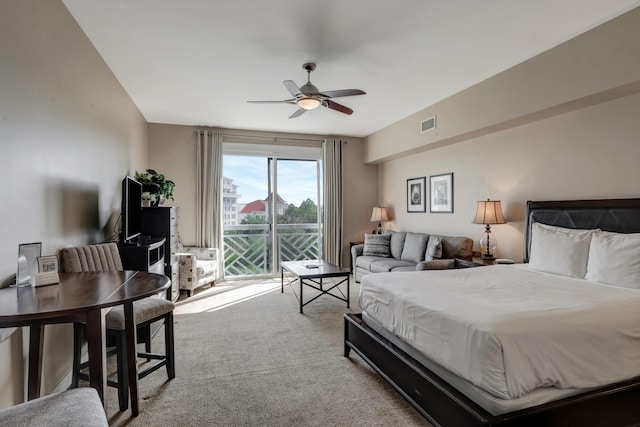 bedroom featuring access to exterior, visible vents, ceiling fan, and carpet floors