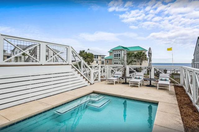 outdoor pool with a patio