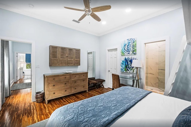 bedroom featuring visible vents, wood finished floors, connected bathroom, crown molding, and ceiling fan