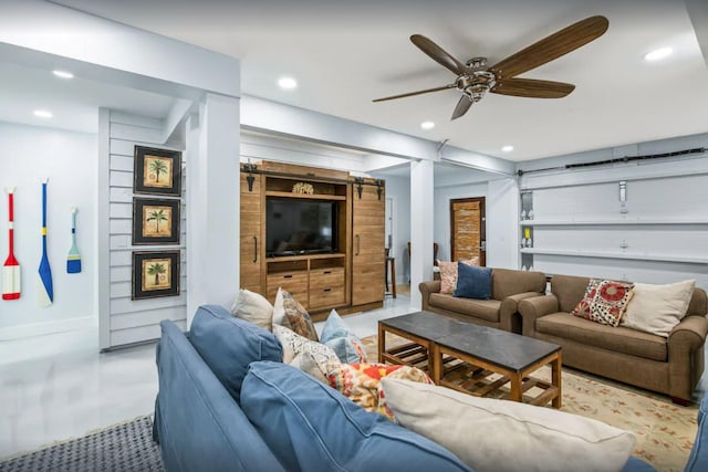 living room with recessed lighting, baseboards, and a ceiling fan