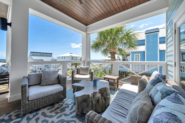 view of patio / terrace with an outdoor living space and a balcony