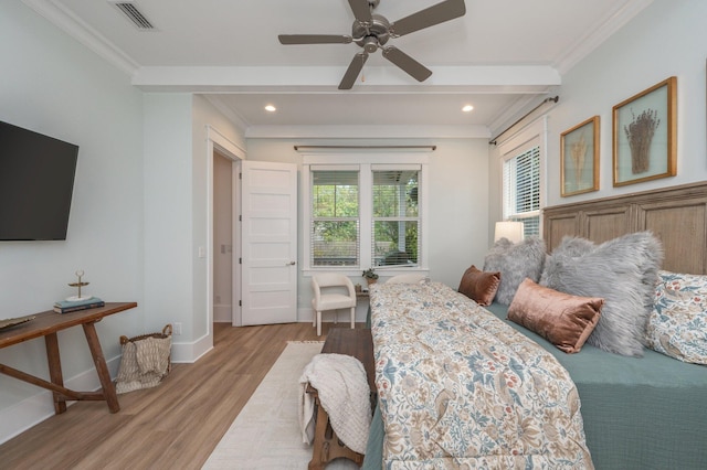 bedroom featuring visible vents, ornamental molding, recessed lighting, light wood finished floors, and baseboards