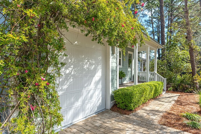 garage with covered porch