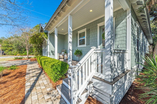 property entrance featuring covered porch