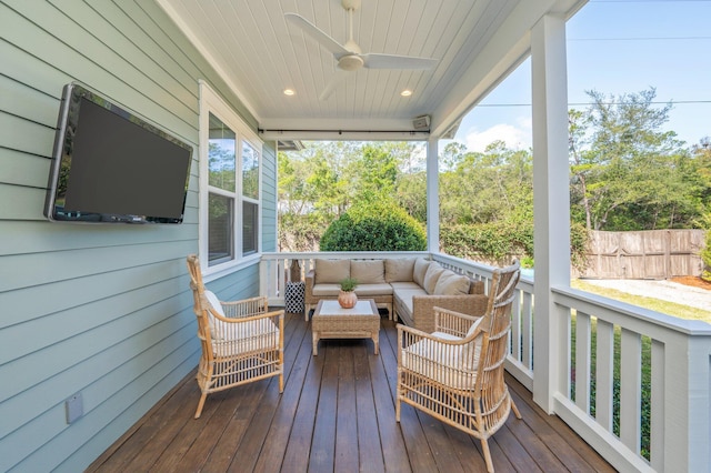 wooden deck featuring a ceiling fan, fence, and an outdoor hangout area