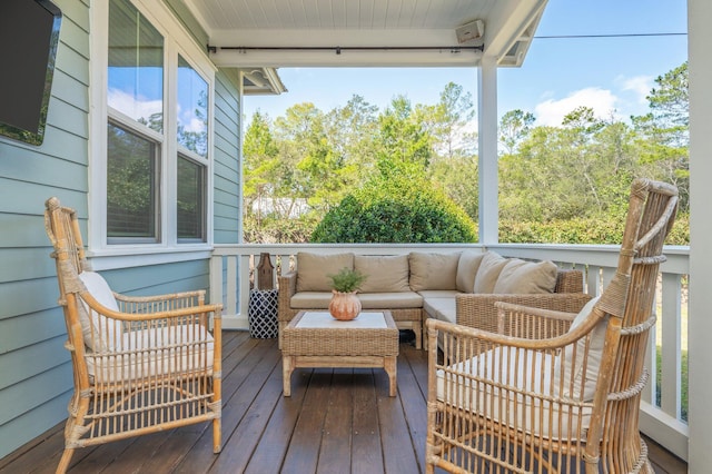 deck featuring outdoor lounge area