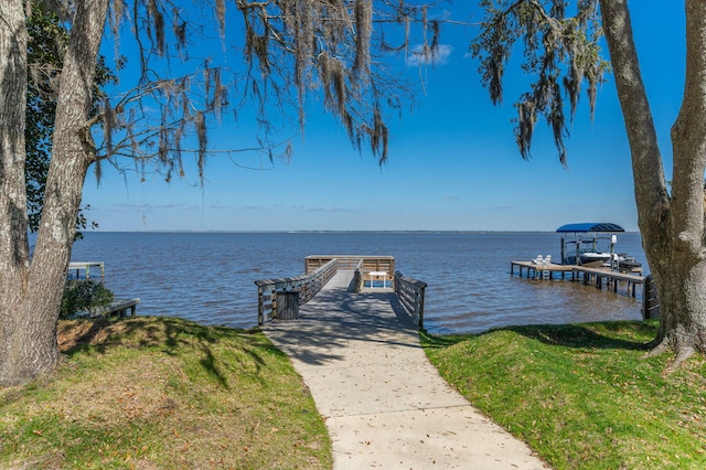 dock area featuring a water view