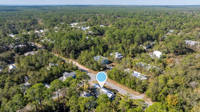 drone / aerial view with a forest view