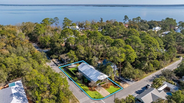 drone / aerial view with a water view