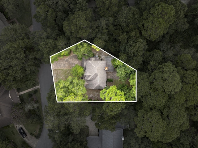 aerial view featuring a view of trees