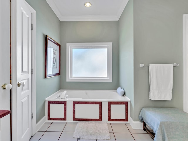 full bathroom featuring tile patterned flooring, a bath, baseboards, and ornamental molding