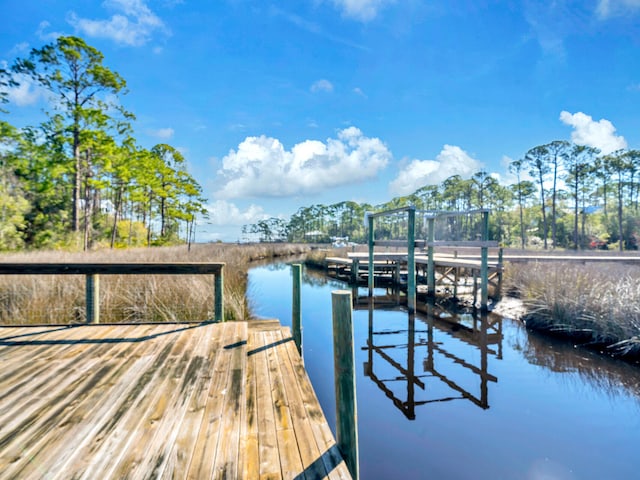 view of dock featuring a water view