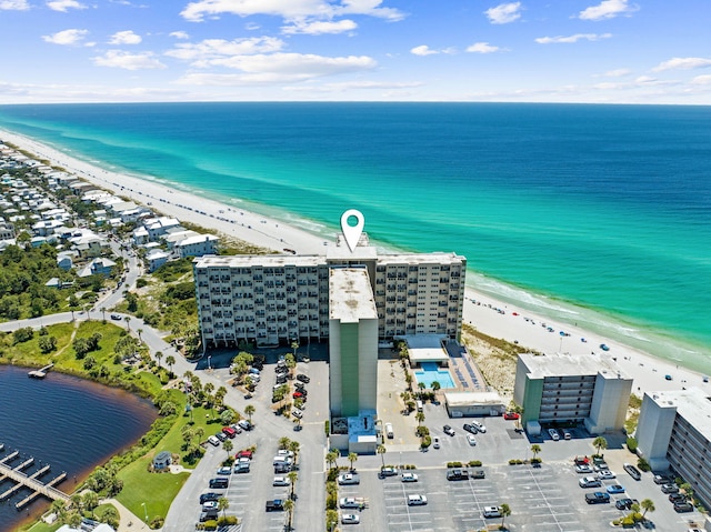 aerial view featuring a view of the beach and a water view