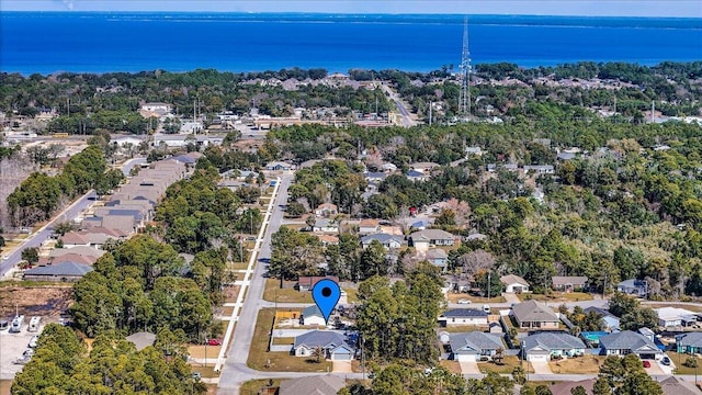 birds eye view of property with a residential view