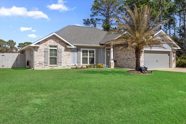 craftsman-style house featuring a front yard, a shingled roof, concrete driveway, a garage, and brick siding