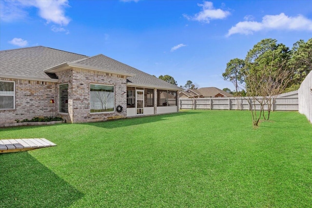 view of yard featuring a fenced backyard