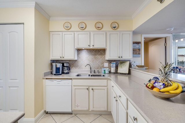 kitchen with ornamental molding, white dishwasher, backsplash, and a sink