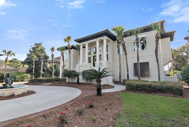 2940 Pine Valley Dr, Miramar Beach, FL 32550 - view of front of property with curved driveway and stucco siding