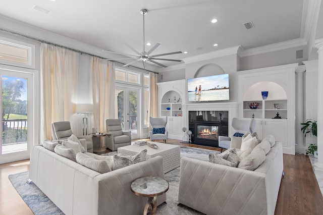 2940 Pine Valley Dr, Miramar Beach, FL 32550 - living area with ornamental molding, ceiling fan, visible vents, and a healthy amount of sunlight