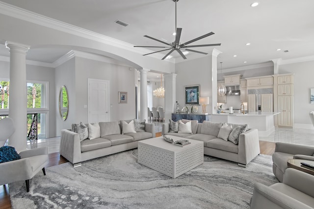 2940 Pine Valley Dr, Miramar Beach, FL 32550 - living area with recessed lighting, a ceiling fan, crown molding, visible vents, and decorative columns