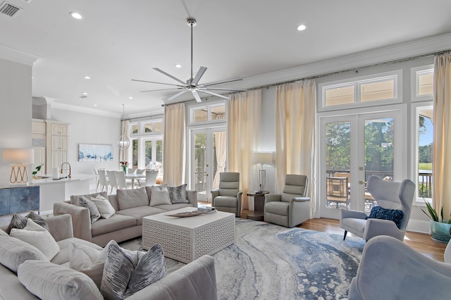 2940 Pine Valley Dr, Miramar Beach, FL 32550 - living area with recessed lighting, french doors, visible vents, and ornamental molding