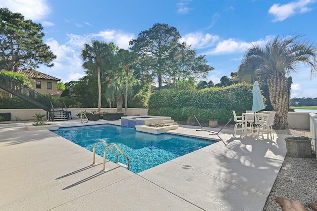 2940 Pine Valley Dr, Miramar Beach, FL 32550 - view of pool with a patio area, an outdoor living space, stairway, and a pool with connected hot tub