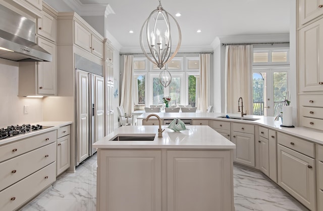 2940 Pine Valley Dr, Miramar Beach, FL 32550 - kitchen with marble finish floor, a sink, wall chimney range hood, and ornamental molding