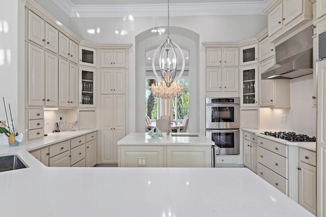 2940 Pine Valley Dr, Miramar Beach, FL 32550 - kitchen with a chandelier, a sink, ornamental molding, and black gas cooktop